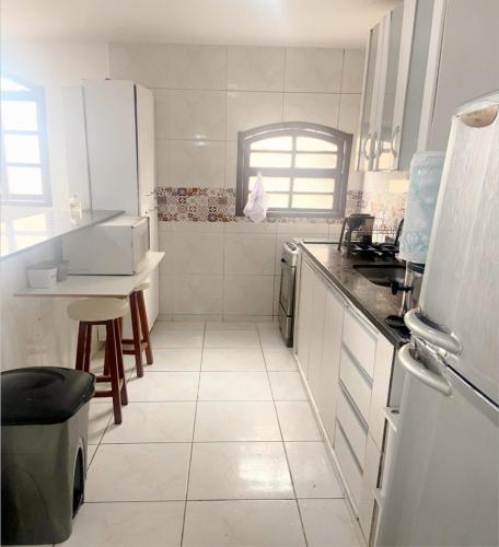 Kitchen, Praiana do Luquinhas - Macumba / Pontal / RicoSurf near Bar Summer Drink's.