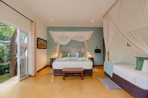 Deluxe Triple Room room in PheZulu Guest Lodge