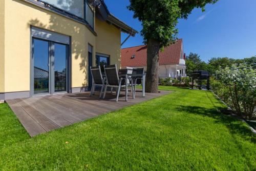 Exterior view, Fewo Sudstrand mit Terrasse, Kamin und Sauna in Ostseebad Sellin