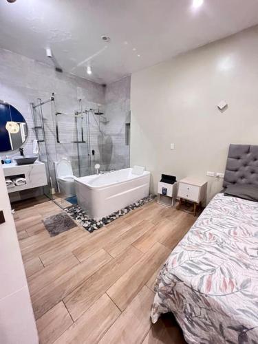 Departamento con Jacuzzi - Tap to explore photos