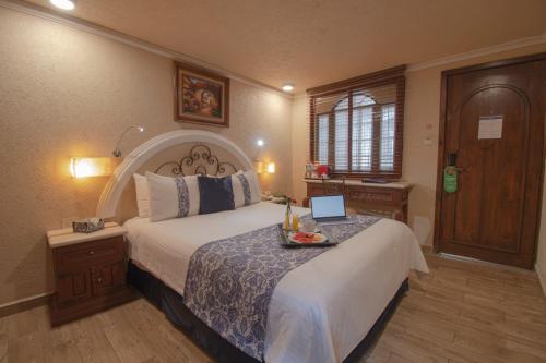 Hotel Arcangel Room Type - Deluxe Room