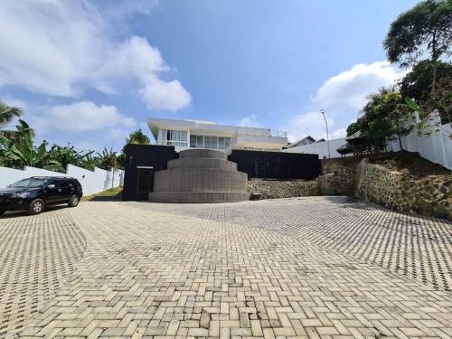 Vila de 700 m2 com 3 quarto(s) e 4 casa(s) de banho(s), na área Megamendung (Montana Sense Villa Sentul 3BR - Mountainview) in Babakan Madang