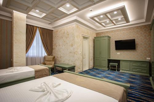 Ervini Boutique Hotel - image 3