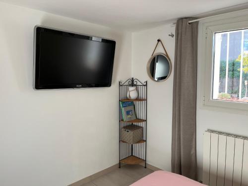 Appartement deux pièces donnant sur un jardin