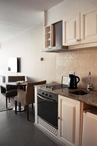 Las Bayas Home Suites - Hotel - Esquel