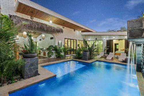Modern Home with Chic Bohemian Style and Zen Outdoor Oasis with Swimming Pool and Tiki Style Dining Space, Potrero