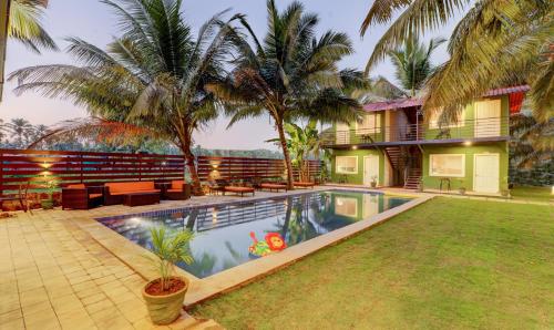 Treebo Morjim Banyan Resort With Swimming Pool - 수영장