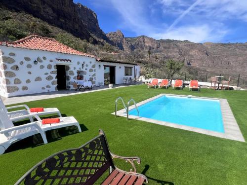 Holiday Home room in Vivelorural Abuela Maria 3 garden & pool