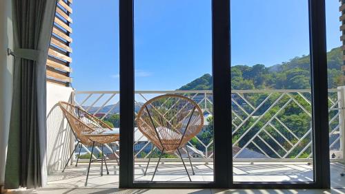 코모도 스위트 다운타운 매니지드 바이 CPM 발리 (Komodo Suites Downtown Managed by CPM Bali) in 라부안 바조