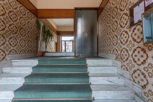 Casa Minù by HAPPYHOSTORINO