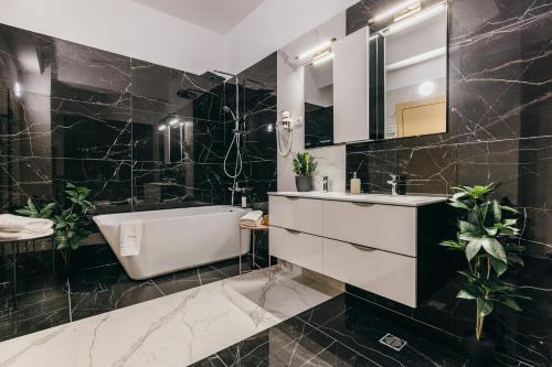 浴室, HOTEL AGORA Mures in 特爾古穆列什