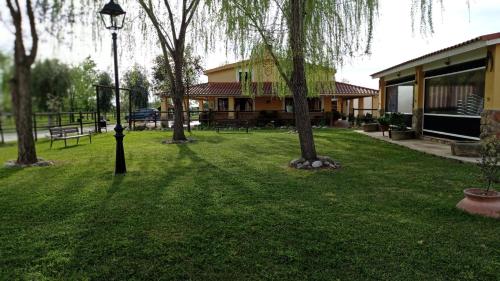 Dārzs, La Posada Hipica in Rosalejo