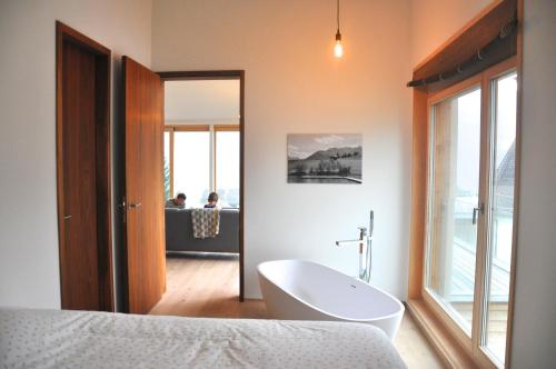 CASA LUMNEZIA - Panoramic Ecodesign Apartment Obersaxen - Val Lumnezia I Vella - Vignogn I near Laax Flims I 5 Swiss stars rating