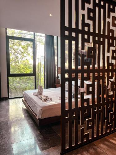 IIK Tulum by Groovy Stays- A Hip Condo-Hotel with WIFI, Rooftop, Pool, Sleeps 6 in Tulum, Mexico