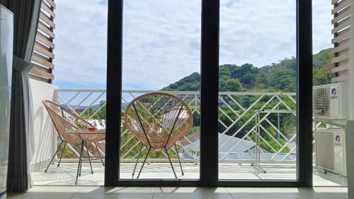 코모도 스위트 다운타운 매니지드 바이 CPM 발리 (Komodo Suites Downtown Managed by CPM Bali) in 라부안 바조