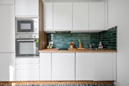 Cucina, Pink Palace - Quartier Authentique Libération (Pink Palace - Quartier Authentique Liberation) in Mantega