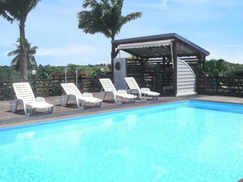 Maison de 3 chambres avec piscine partagee jardin clos et wifi a Sainte Anne a 3 km de la plage - Location saisonnière - Sainte-Anne