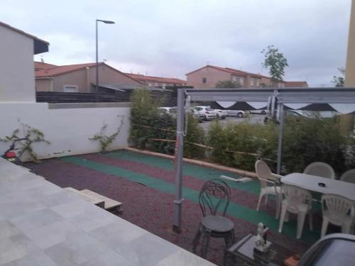 Erkély/terasz, Maison charmante à Rivesaltes, jardin clôturé (Maison charmante a Rivesaltes, jardin cloture) in Rivesaltes