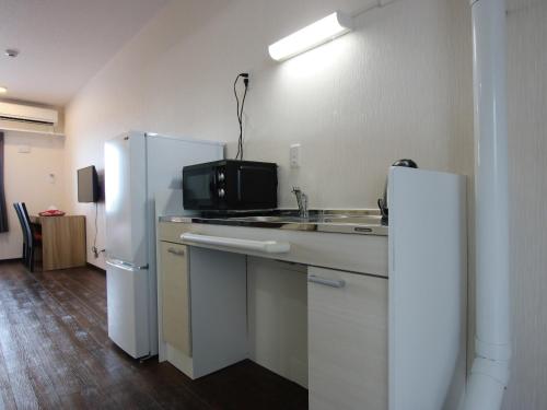 Kitchen, AMAWARI HOTEL in Uruma