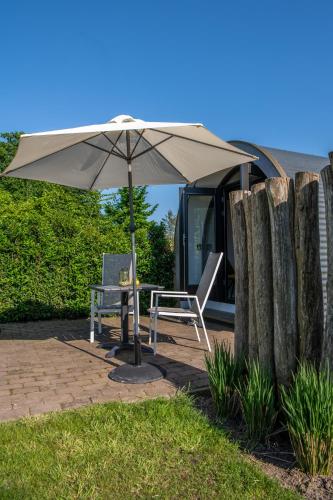 Tiny Natuurlodge voor 2 personen met vrij uitzicht over landerijen