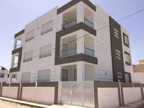 Зовнішній вигляд готелю, Joli Appartement S2 neuf de standing Kelibia in Келібія