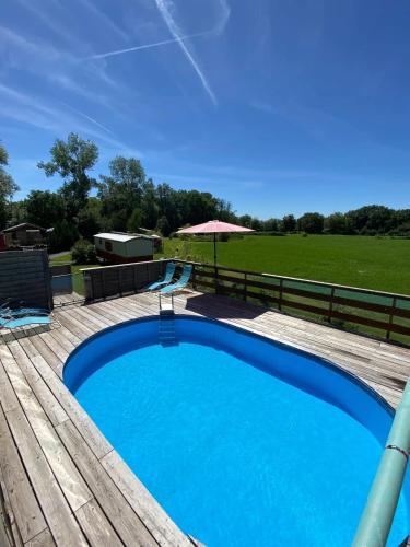 Bungalow de 2 chambres avec piscine partagee jardin clos et wifi a Saint Pardoux