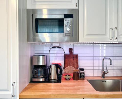 บริการและสิ่งอำนวยความสะดวก, Sentrum - Koselig hus med parkering in อาเร็นดาล