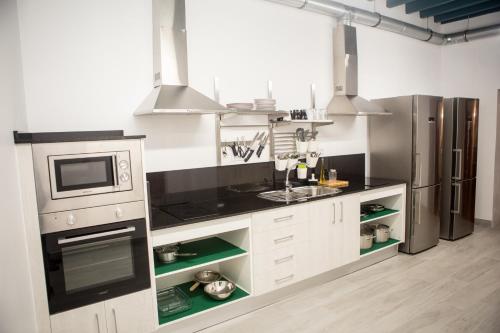 Cocina, Vivian's Hostel VGH Auto Check-in in Jerez de la Frontera