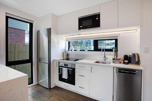 Modern Family Home 7km Airport Free Park, Auckland (Foto 9)
