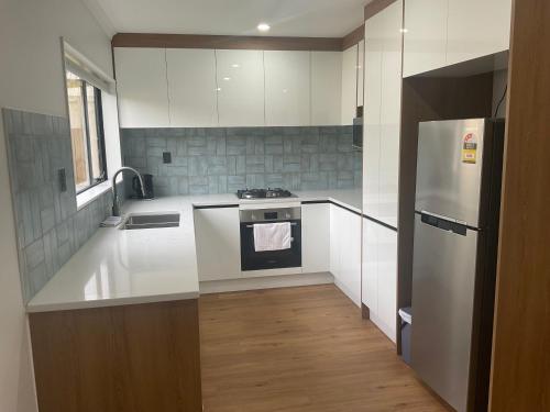 Holiday Home East Auckland in هوويك