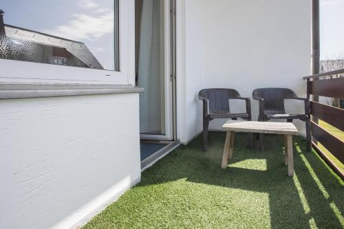 Welcome in - Appartement 'Sahneblick' met balkon en berging, dichtbij de skipistes in อัลทาสเทนแบร์ก