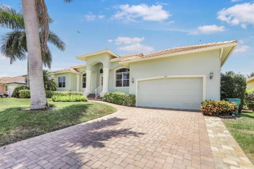 Pet-friendly waterfront home near beach with pool