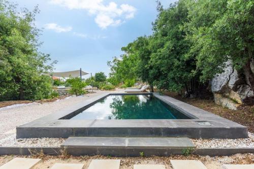 Swimming pool, Amani Luxury 4-Bedroom Villa & Pool in Batroun in Ghalboun