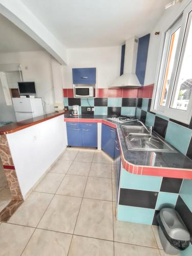 Appartement de 2 chambres avec piscine partagee jardin clos et wifi a Sainte Anne a 3 km de la plage in Berard