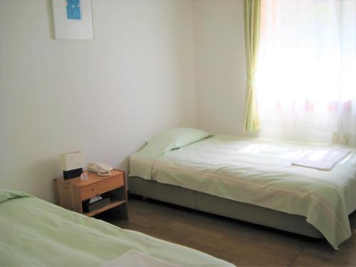Ernest House – Shimoda, KY
