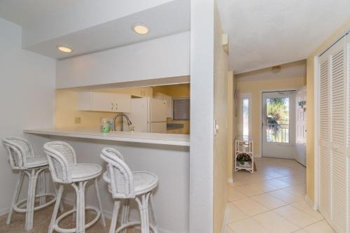 Pet Friendly Bouchelle Island Condo Pool Hot Tub Seconds to the Beach in New Smyrna Beach, USA