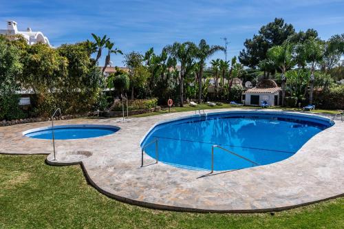 สวน, Ultimate Rentals - Heerlijk Appartement Op Loopafstand Van Het Strand - Gezamenlijk Zwembad in เอล ปาไรโซ