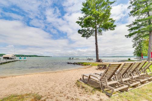 Modern Torch Lake Cottage with Dock and Fire Pit! - main image