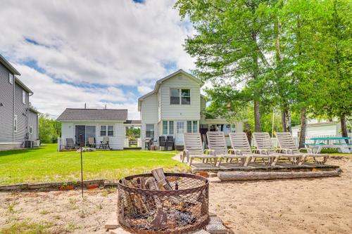 Modern Torch Lake Cottage with Dock and Fire Pit! - image 2