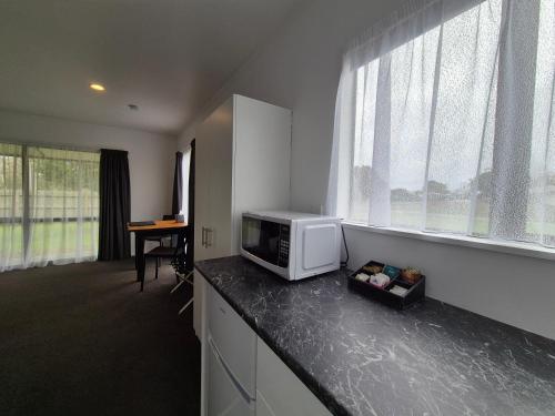 บริการและสิ่งอำนวยความสะดวก, Magnolia Court Motel in โอโพทิกิ