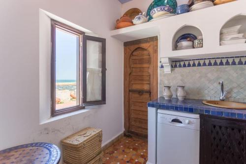 Casa mesana in 艾西拉