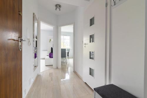 avla, Apartament Olsztyn Rataja 62 in Osiedle Podlesna