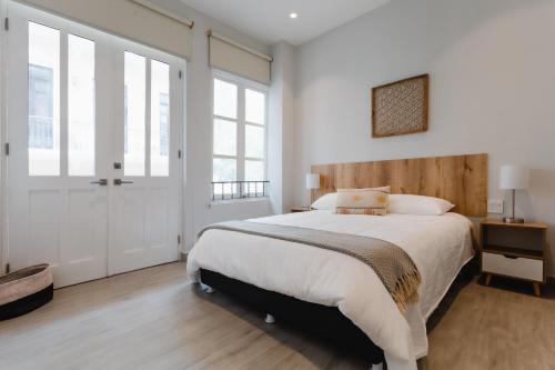 One-Bedroom Apartment with Balcony and City View image 10