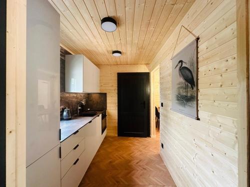 DOMKI Leśna Cisza jezioro Powidzkie dla 18 osób - 5D Apartments (DOMKI Lesna Cisza jezioro Powidzkie dla 18 osob - 5D Apartments) in Przybrodzin