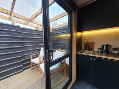 Cass Bay Retreat with Outdoor Bath Christchurch in Cass Bay