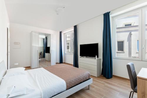 ห้องส่วนกลางสำหรับนั่งเล่น/ดูทีวี, Residence Torvaianica in โพเมซีอา