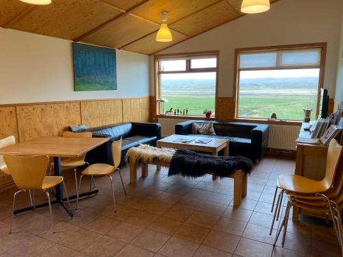 Koplietošanas atpūtas telpa ar TV, Brekkulækur Guesthouse in Tjarnarbrekka