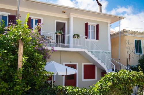 Exterior view of To Patriko Lefkada Cozy Village Home with Parking