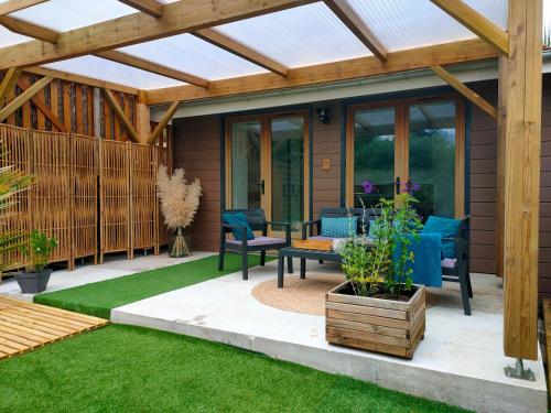 Terraza/balcón, Chalet vacances avec jardin près d'Arcachon 2 personnes (Chalet vacances avec jardin pres d'Arcachon 2 personnes) in La Teste-de-Buch