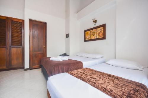 1 double bed, 3 twin beds